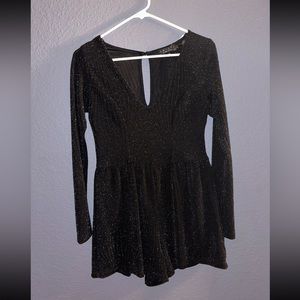 Brand new with tags. Black sparkly long sleeve romper. Francesca’s size medium!